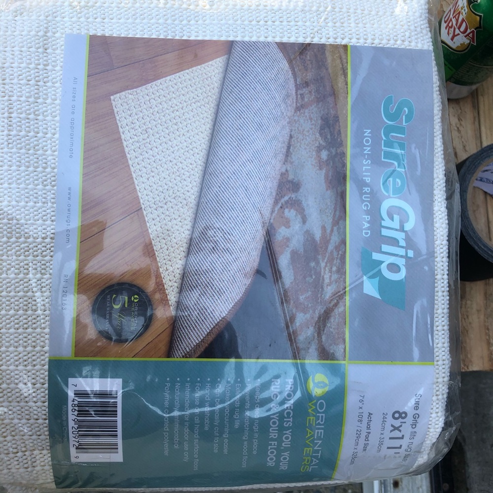 Sure grip under rug mat